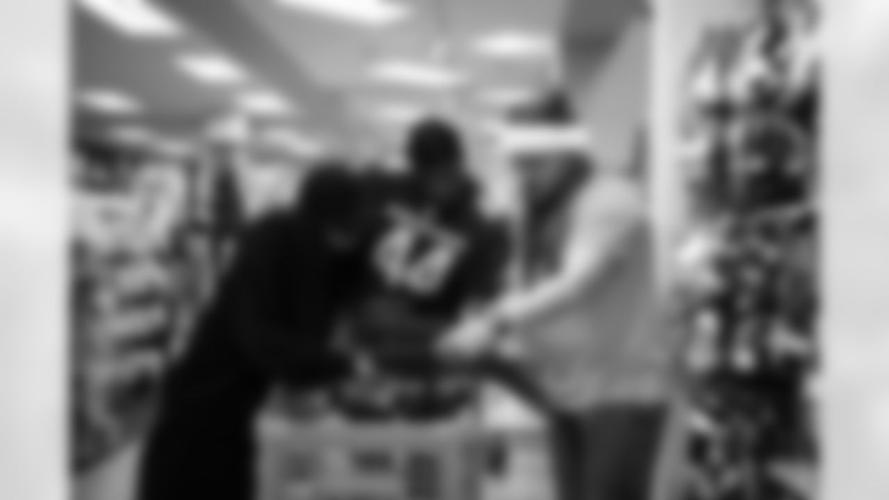 The Arizona Cardinals and Desert Financial Credit Union host a holiday shopping event at SCHEELS Chandler on Tuesday, Dec. 9, 2025 in Chandler, AZ.