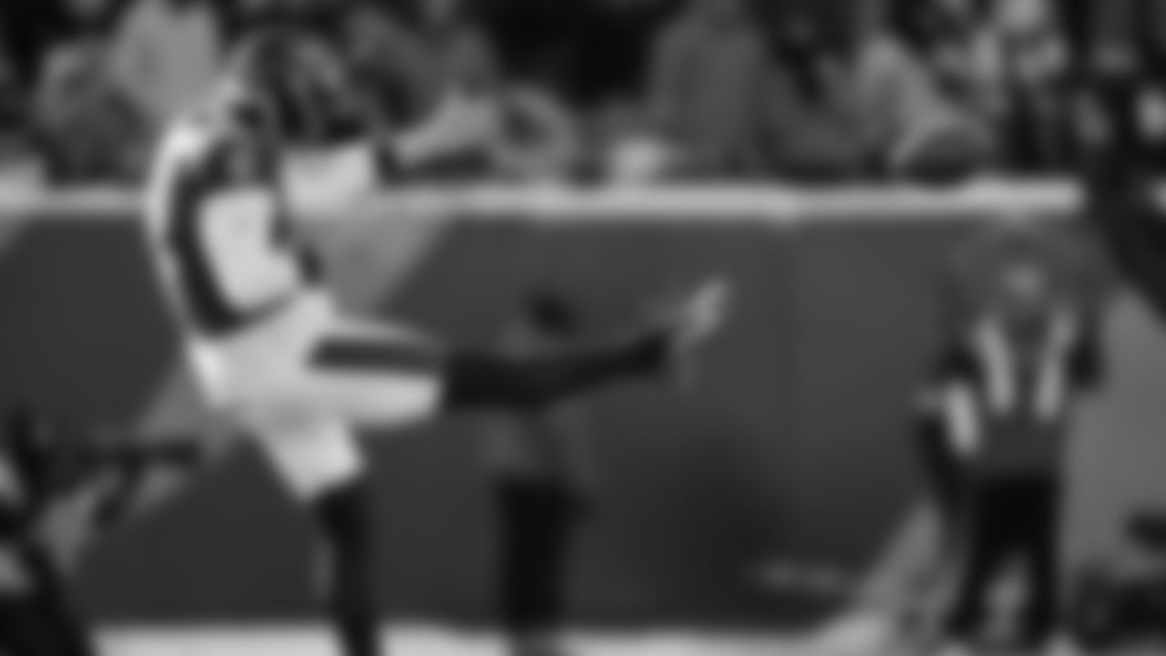 Baltimore Ravens punter Jordan Stout (11) punts during the first half of an NFL football game against the Cincinnati Bengals, Sunday, Dec. 14, 2025, in Cincinnati. (AP Photo/Carolyn Kaster)