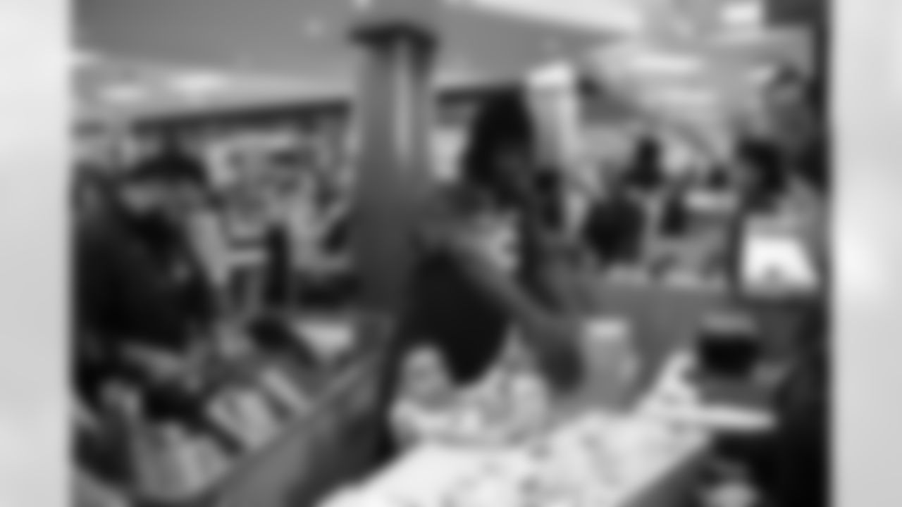 The Arizona Cardinals and Desert Financial Credit Union host a holiday shopping event at SCHEELS Chandler on Tuesday, Dec. 9, 2025 in Chandler, AZ.