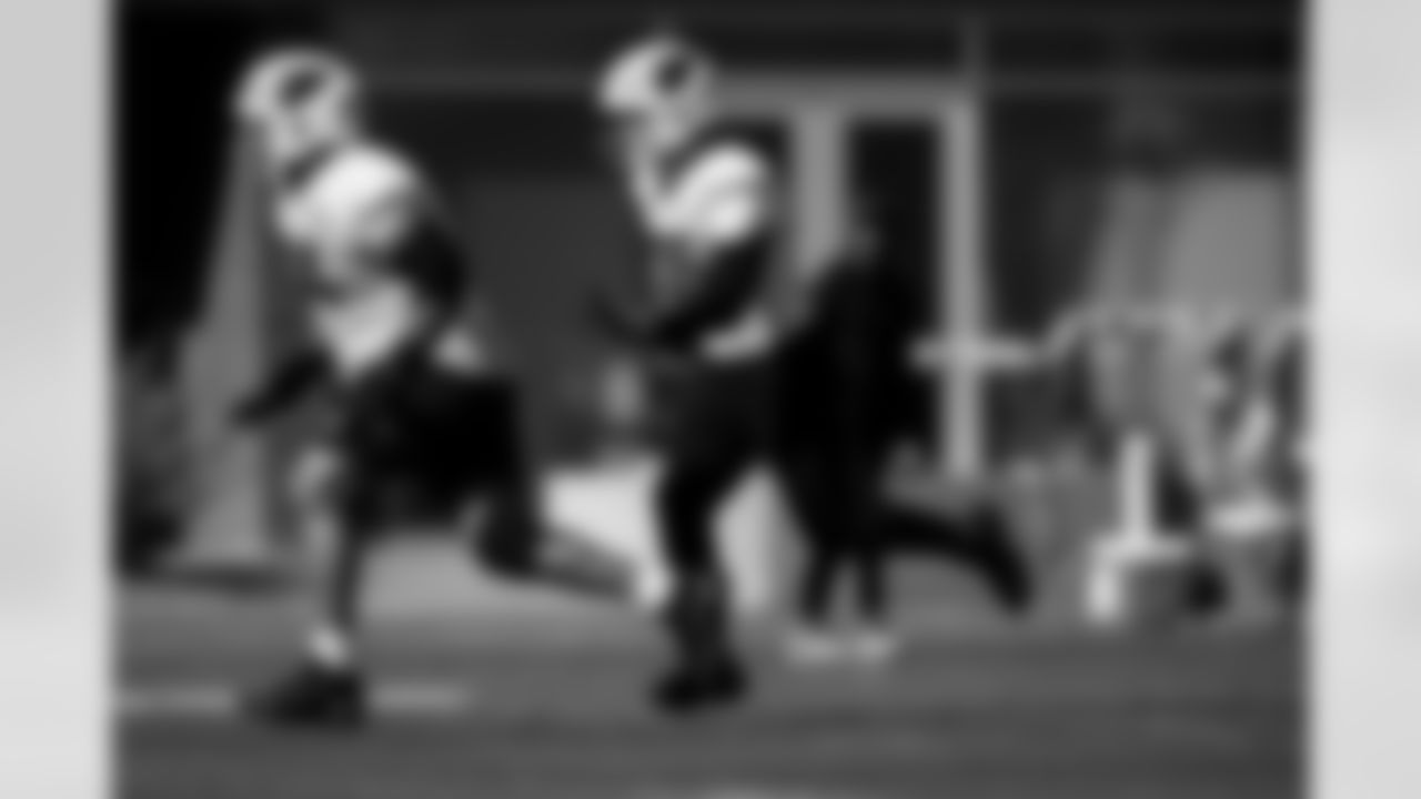 Arizona Cardinals tight end Trey McBride (85) and Arizona Cardinals offensive lineman Isaiah Adams (74) during practice at the Dignity Health Training Facility on Wednesday, Dec. 10, 2025 in Tempe, AZ.