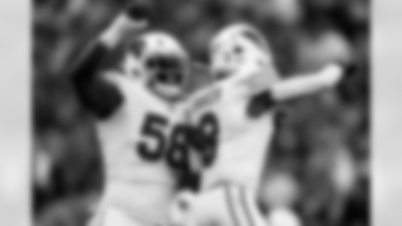 Arizona Cardinals defensive lineman Darius Robinson (56) and Arizona Cardinals safety Budda Baker (3) during the Week 10 regular season game between the Arizona Cardinals and the Seattle Seahawks on Sunday, Nov. 9, 2025 in Seattle, WA.