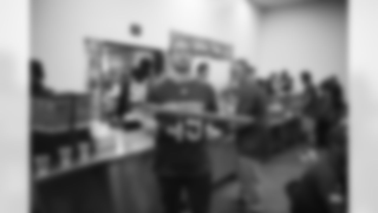 The Arizona Cardinals serve holiday meals at Phoenix Rescue Mission on Monday, Nov. 20, 2023 in Phoenix, AZ.