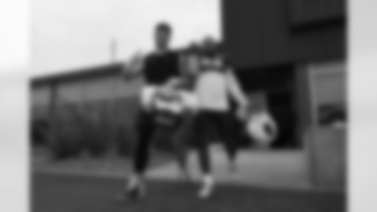 Arizona Cardinals tight end Trey McBride (85) and Arizona Cardinals safety Dadrion "Rabbit" Taylor-Demerson (42) during practice at the Dignity Health Training Facility on Thursday, Oct. 9, 2025 in Tempe, AZ.