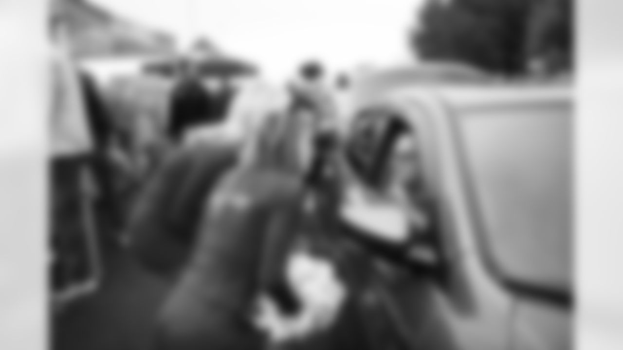 State Farm, Desert Financial Credit Union, and the Arizona Cardinals teamed up with United Food Bank to donate meals to local families in need at Mesa Convention Center on Wednesday, Nov. 19, 2025 in Mesa, AZ.