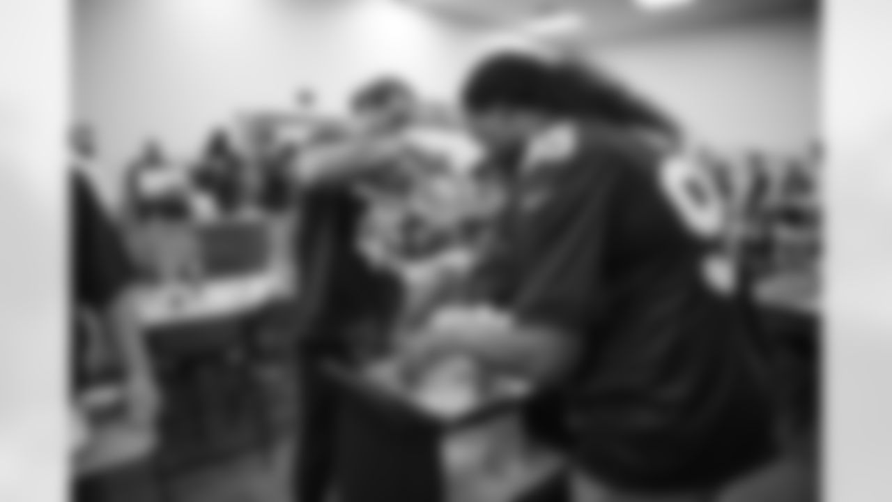The Arizona Cardinals serve holiday meals at Phoenix Rescue Mission on Monday, Nov. 20, 2023 in Phoenix, AZ.