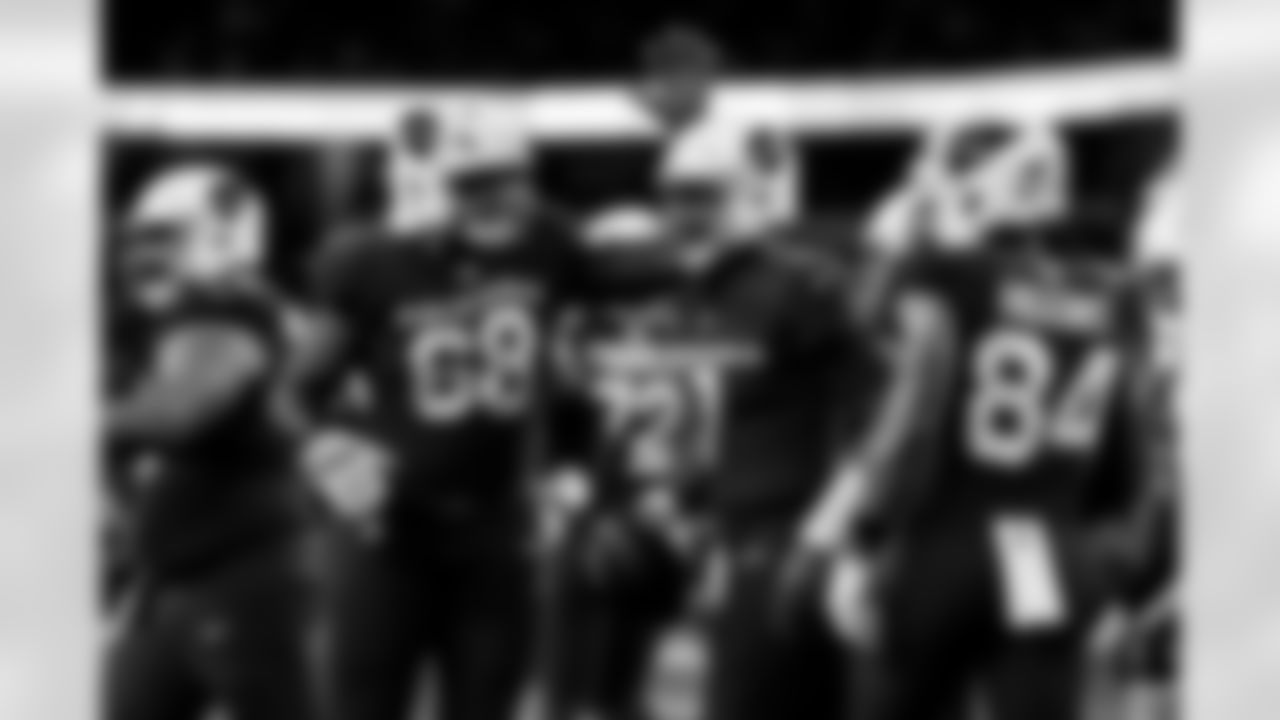 Arizona Cardinals quarterback Jacoby Brissett (7) and Arizona Cardinals offensive lineman Kelvin Beachum (68) during the Week 9 regular season game between the Arizona Cardinals and the Dallas Cowboys on Monday, Nov. 3, 2025 in Arlington, TX.