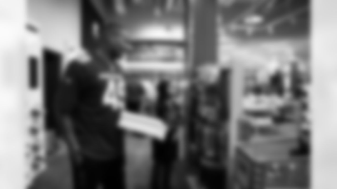 The Arizona Cardinals and Desert Financial Credit Union host a holiday shopping event at SCHEELS Chandler on Tuesday, Dec. 9, 2025 in Chandler, AZ.