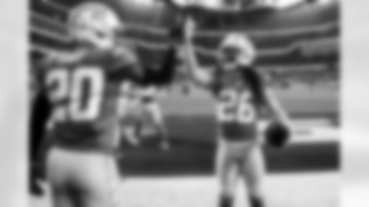 CB Cam Hart (20) and CB Donte Jackson (26)