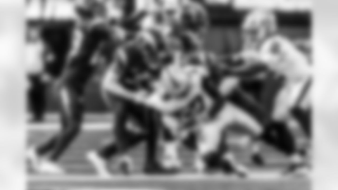 Take a look back at the Chargers Week 13 matchup with the Raiders in monochrome.