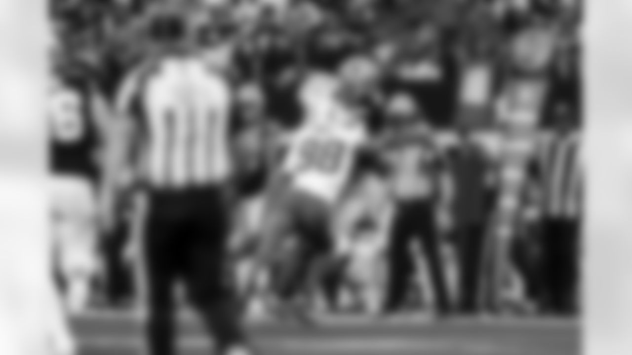 OLB Odafe Oweh (98) and OLB Tuli Tuipulotu (45)