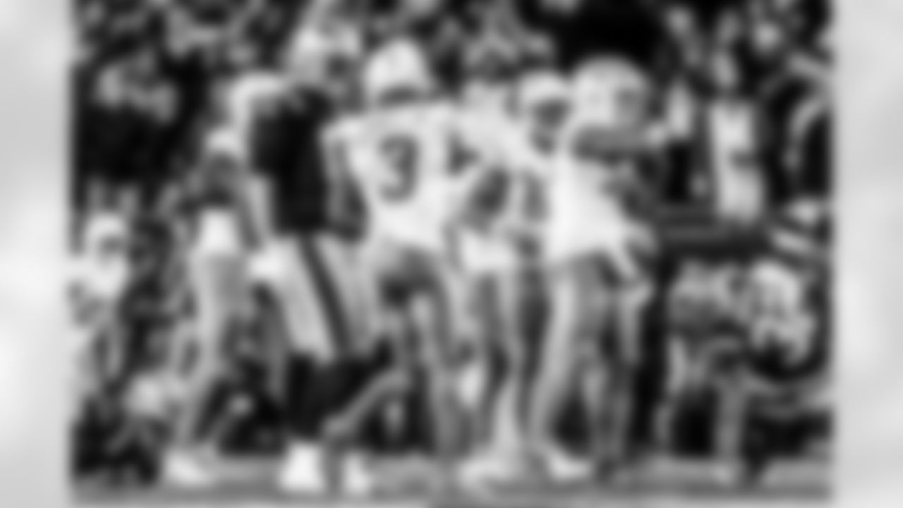 Take a look back at the Chargers Wild Card matchup with the Patriots in monochrome.