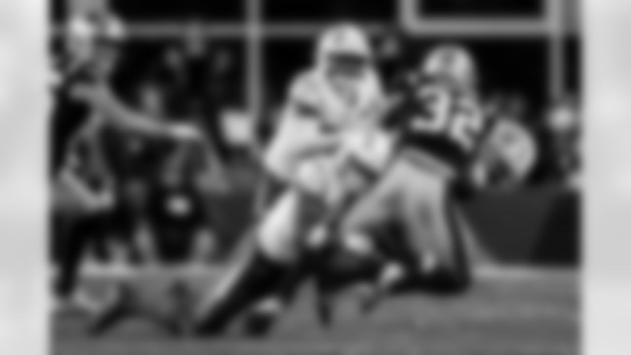 Check out the best shots from the Chargers Wild Card matchup against the Patriots!