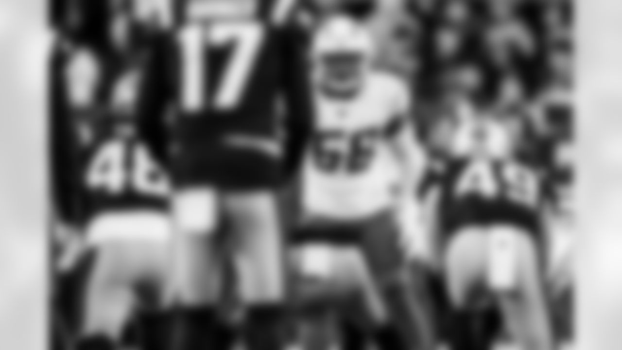 Check out the best shots from the Chargers Wild Card matchup against the Patriots!