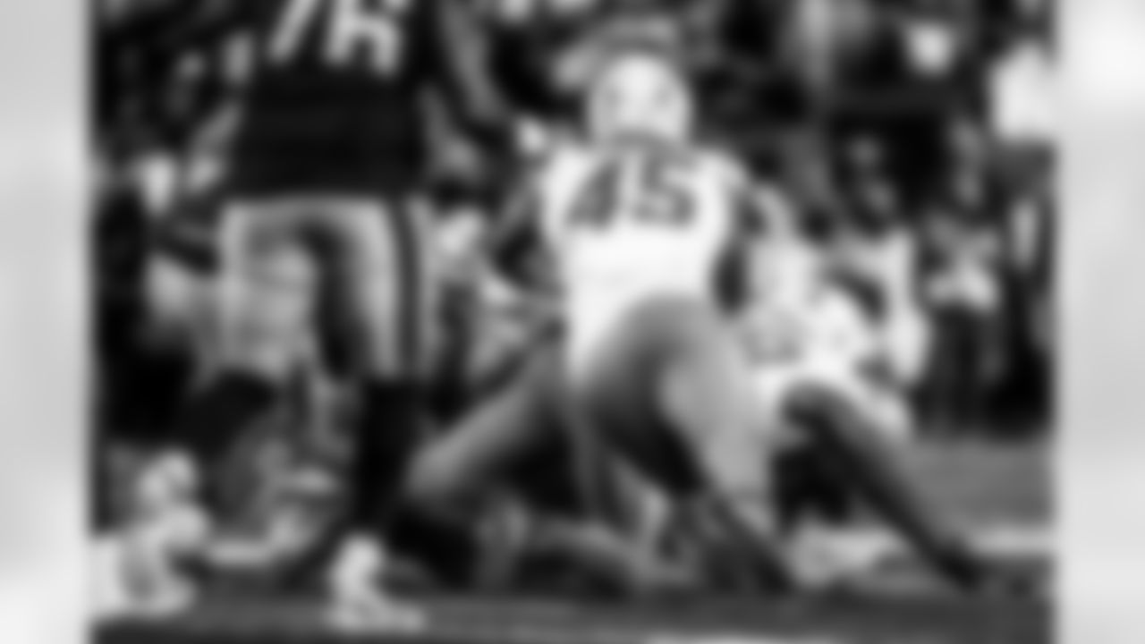 Take a look back at the Chargers Wild Card matchup with the Patriots in monochrome.