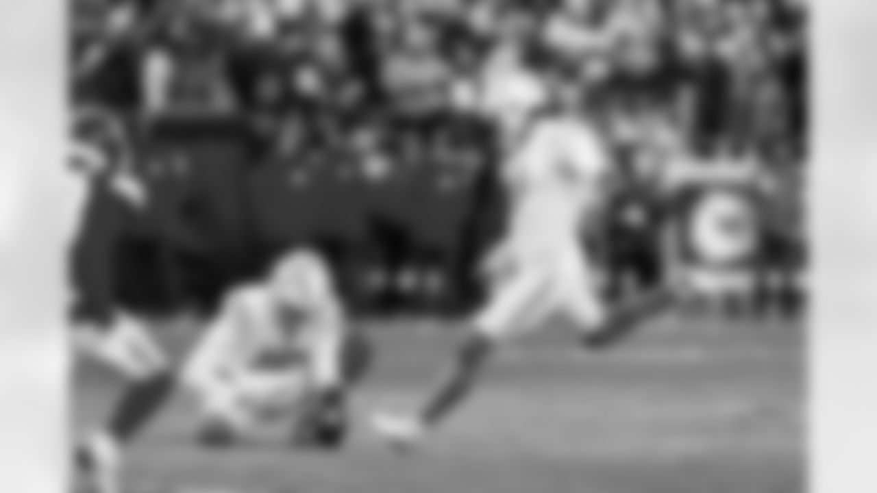 P JK Scott (16) and K Cameron Dicker (11)