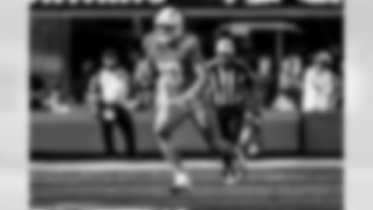 Take a look back at the Chargers Week 5 matchup with the Commanders in monochrome!