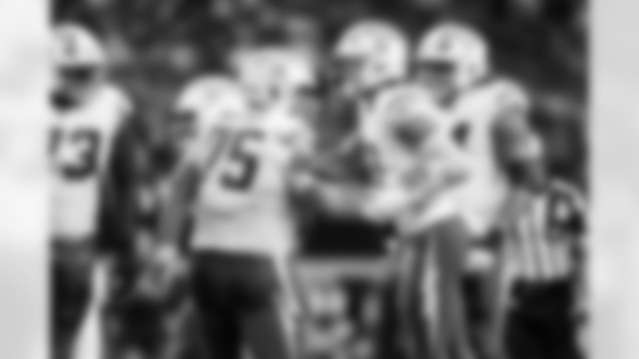 C Bradley Bozeman (75) and QB Justin Herbert (10)