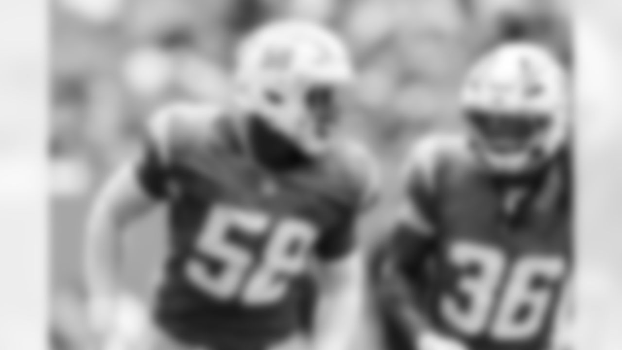 LB Marlowe Wax (58) and DB Ja'Sir Taylor (36)