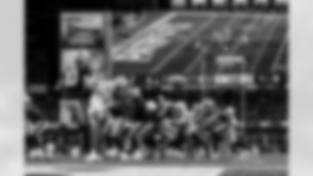 Check out the best shots from the Chargers Wild Card matchup against the Patriots!