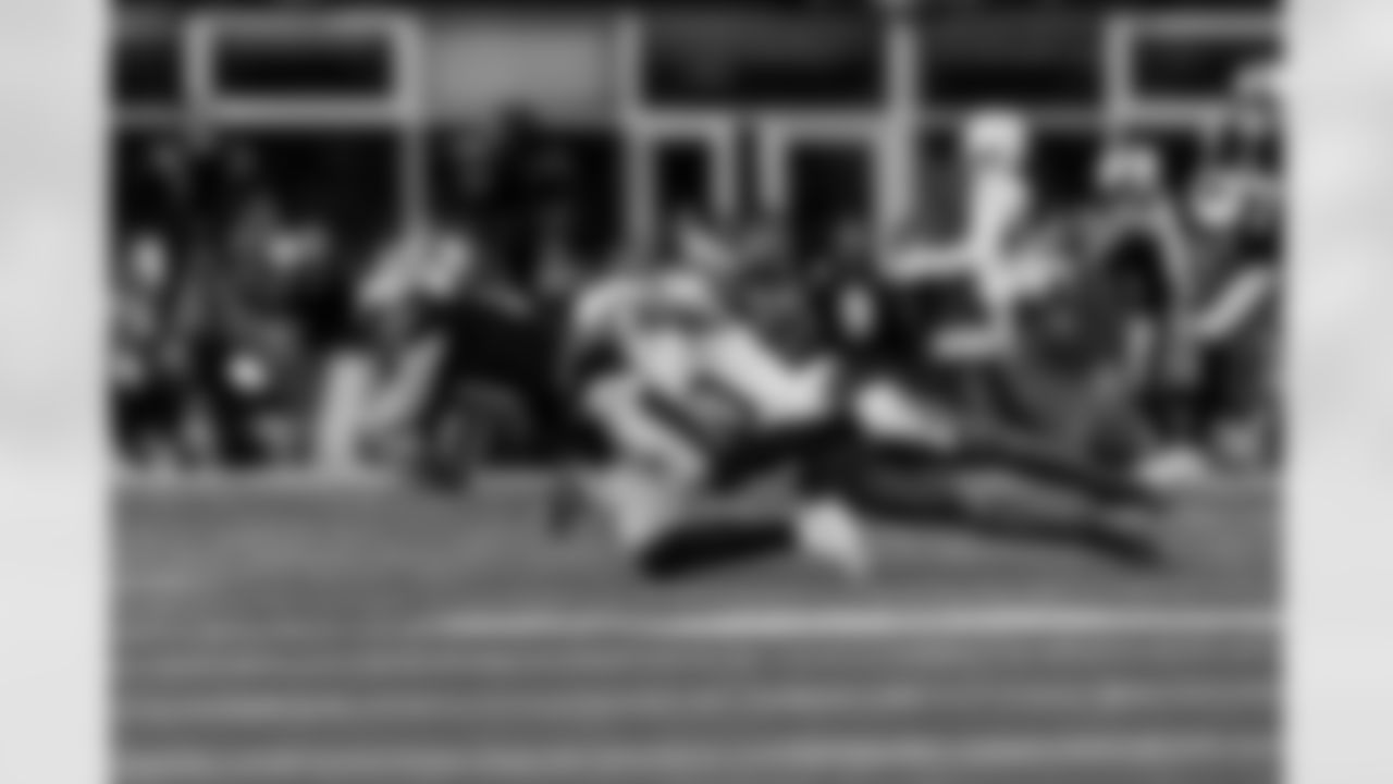 Check out the best shots from the Chargers Wild Card matchup against the Patriots!