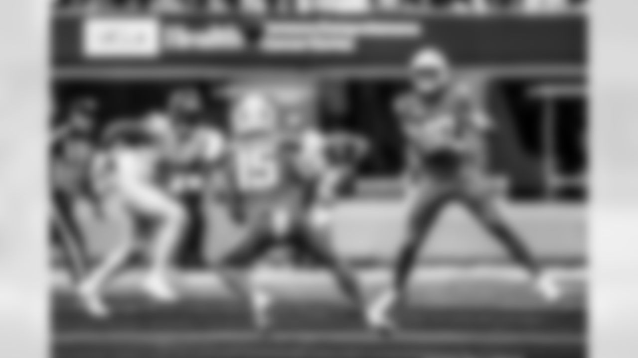 Take a look back at the Chargers Week 5 matchup with the Commanders in monochrome!