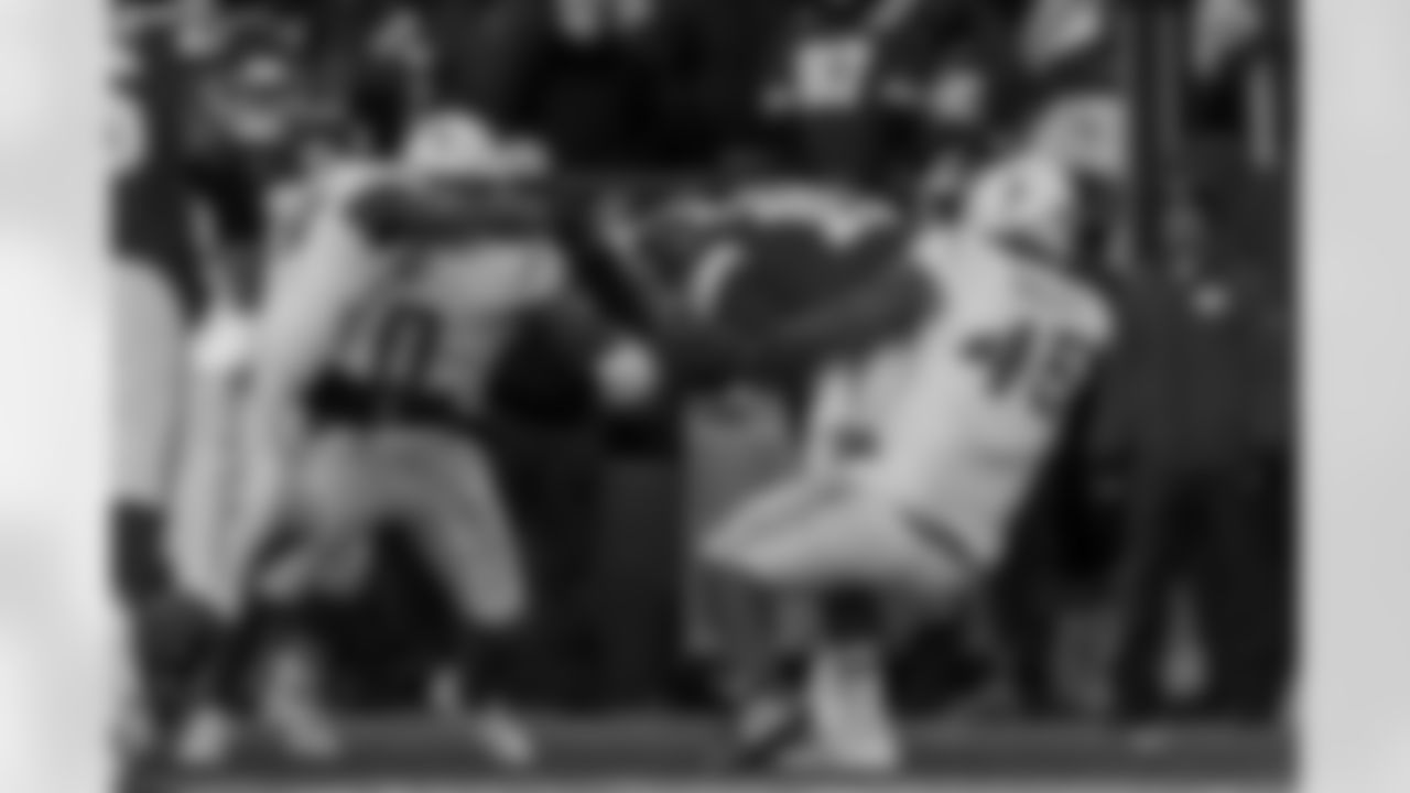 Chargers OLB Tuli Tuipulotu (#45) in action during their Pro Bowl season.