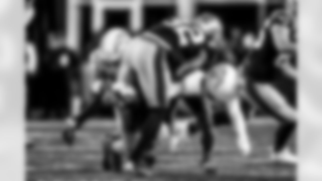 Take a look back at the Chargers Wild Card matchup with the Patriots in monochrome.