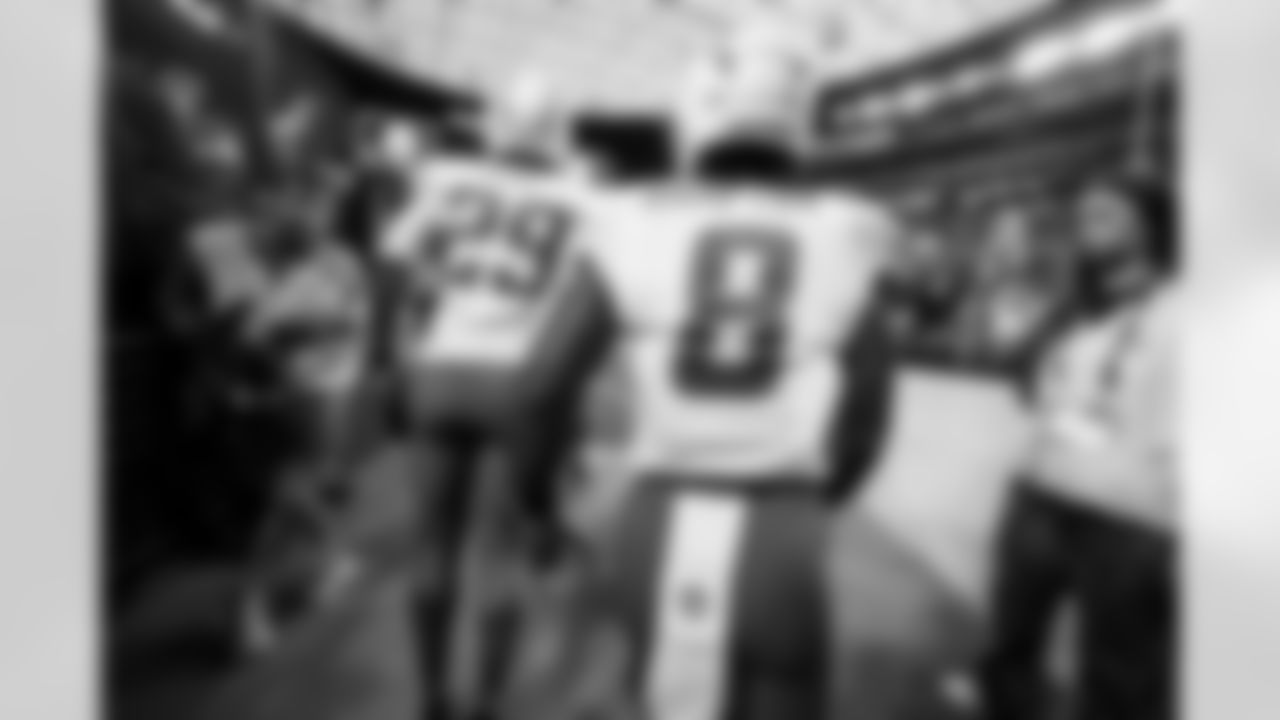 CB Tarheeb Still (29) and RB Omarion Hampton (8)