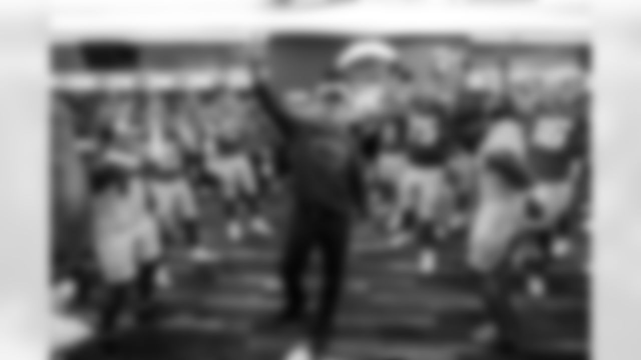 WR Ladd McConkey (15), Head Coach Jim Harbaugh, C Bradley Bozeman (75), S Derwin James Jr. (3) and QB Justin Herbert (10)