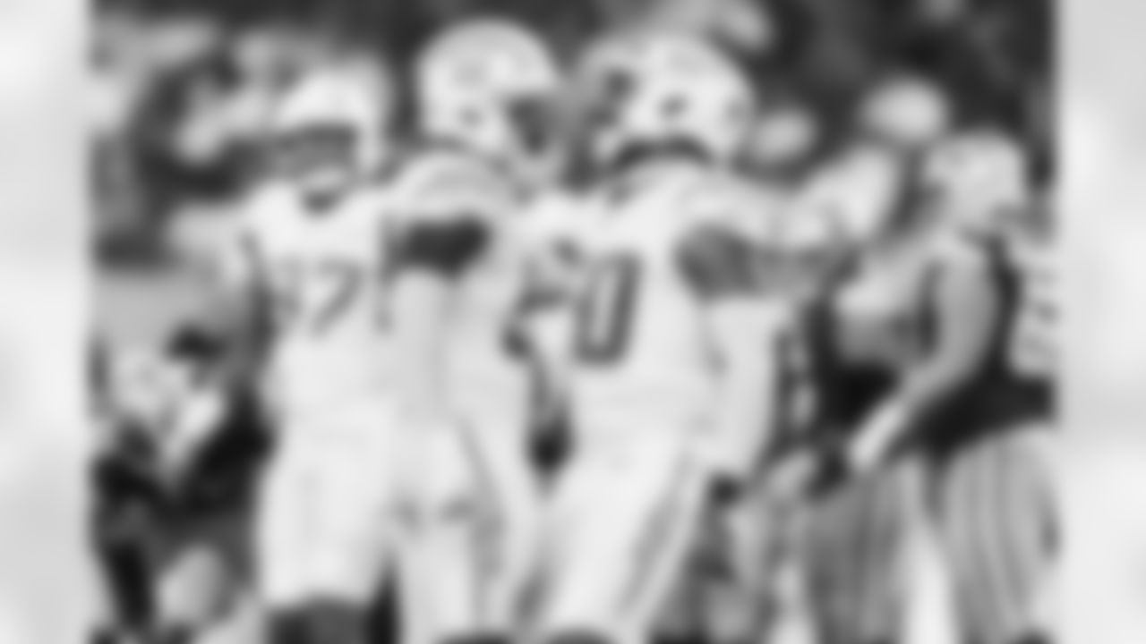 LB Marlowe Wax (58) and OLB Caleb Murphy (50)