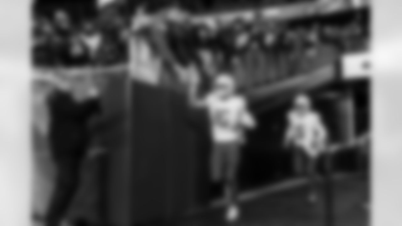 Check out the best shots from the Chargers Wild Card matchup against the Patriots!