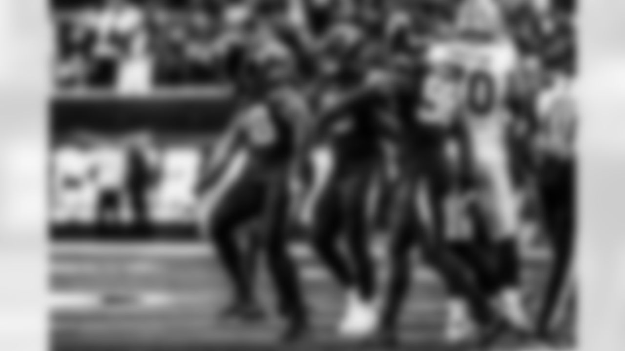 Take a look back at the Chargers Week 13 matchup with the Raiders in monochrome.