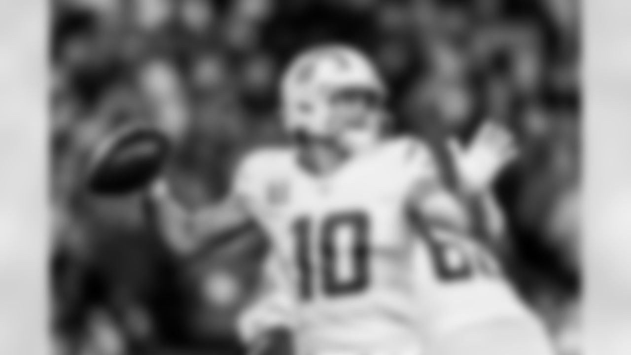 Check out the best shots from the Chargers Wild Card matchup against the Patriots!