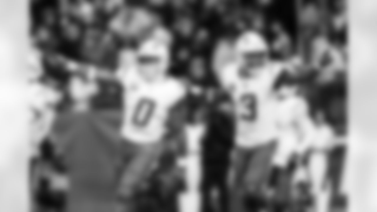 LB Daiyan Henley (0) and S Derwin James Jr. (3)