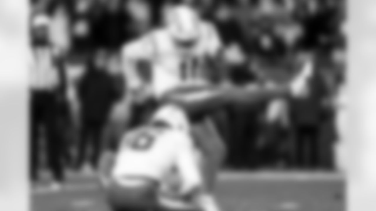 P JK Scott (16) and K Cameron Dicker (11)