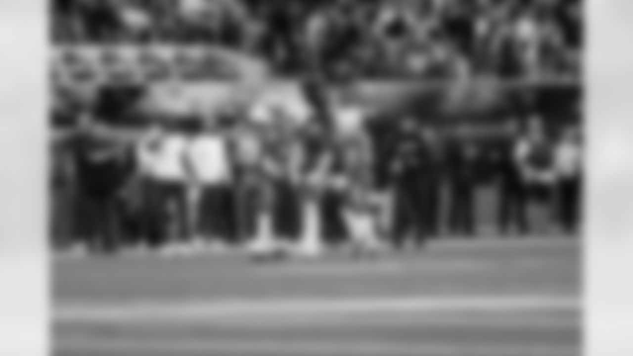 CB Tarheeb Still (29) and LB Daiyan Henley (0)