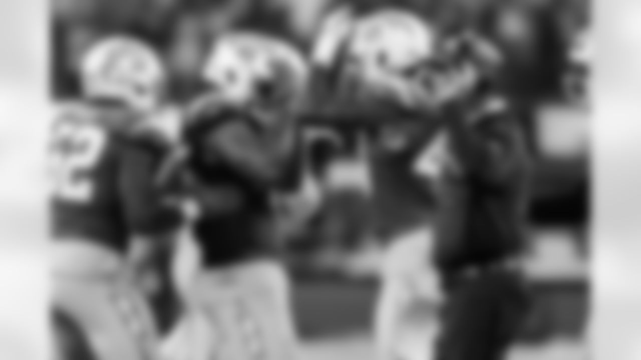 OLB Tuli Tuipulotu (45) and OLB Bud Dupree (48)