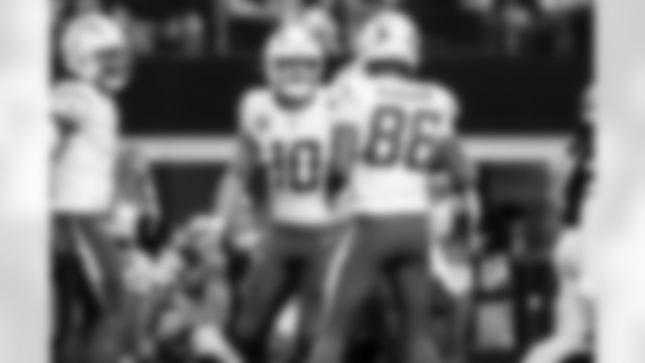 QB Justin Herbert (10) and TE Oronde Gadsden (86)