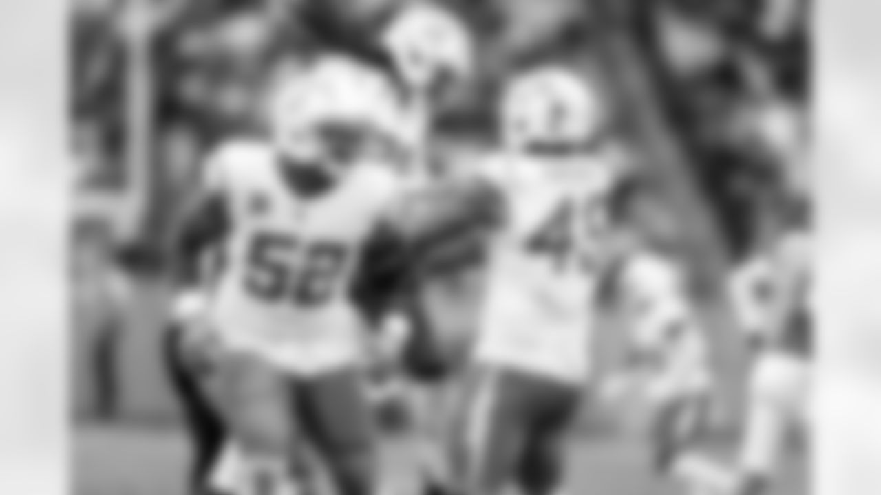 CB Donte Jackson (26) and OLB Tuli Tuipulotu (45)