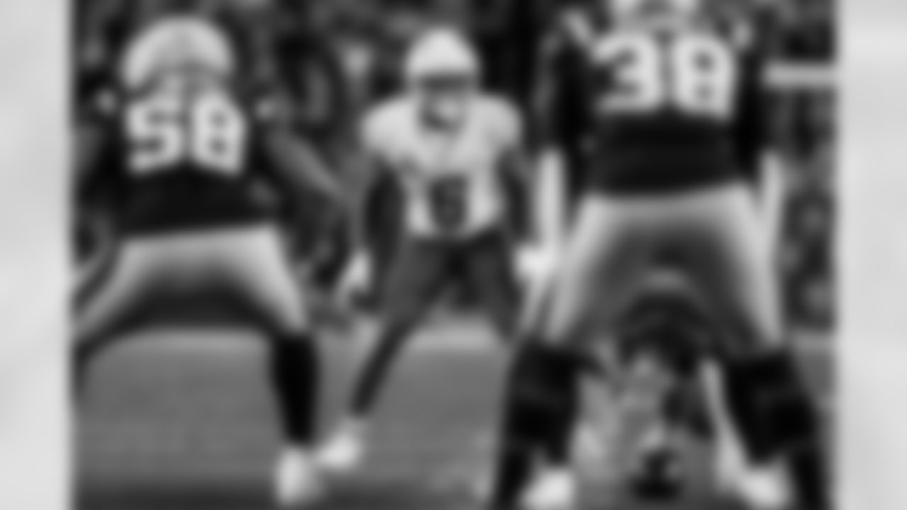 Check out the best shots from the Chargers Wild Card matchup against the Patriots!