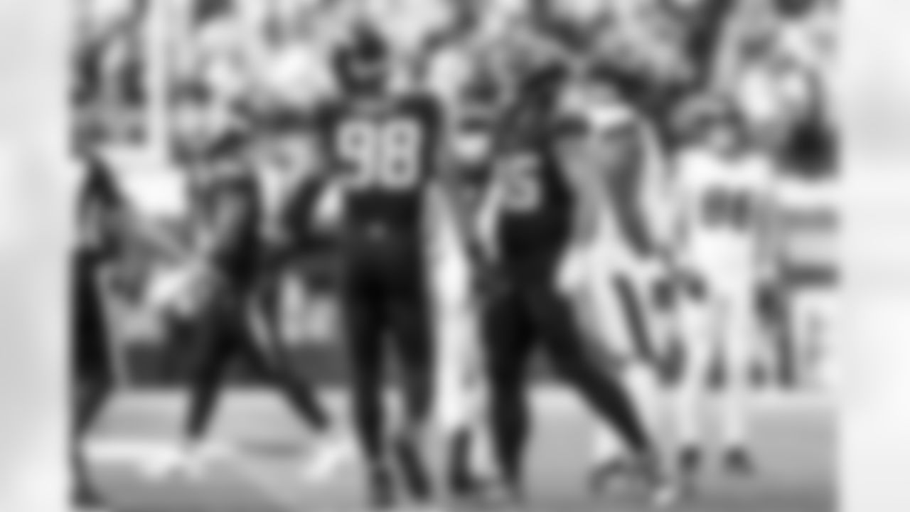 OLB Odafe Oweh (98) and OLB Tuli Tuipulotu (45)