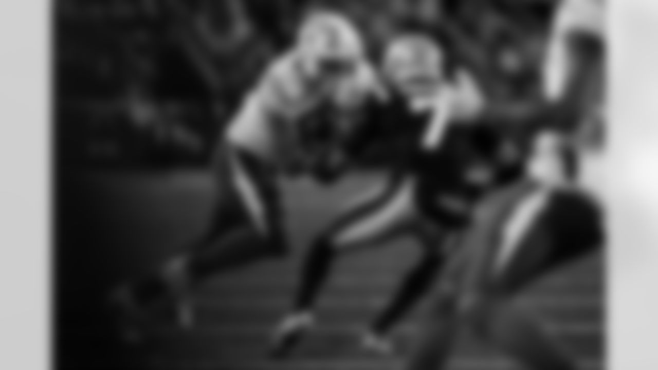 Check out the best shots from the Chargers Wild Card matchup against the Patriots!