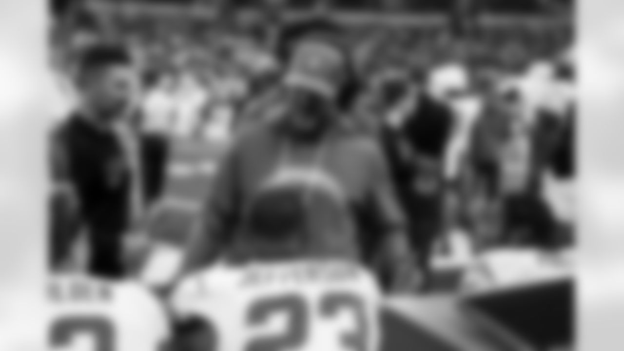 S Tony Jefferson (23), Defensive Coordinator Jesse Minter and LB Del'Shawn Phillips (53)