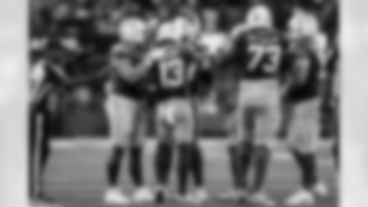 WR Keenan Allen (13), DL Scott Matlock (44) and G Mekhi Becton (73)