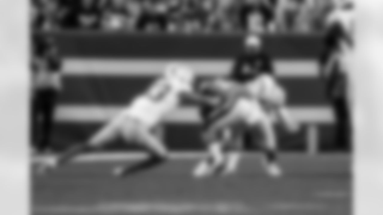 DB Deane Leonard (33) and S Tony Jefferson (23)