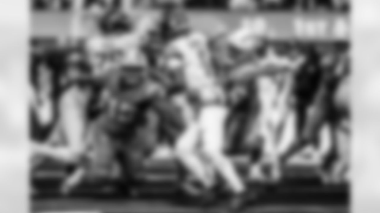 Take a look back at the Chargers Week 5 matchup with the Commanders in monochrome!