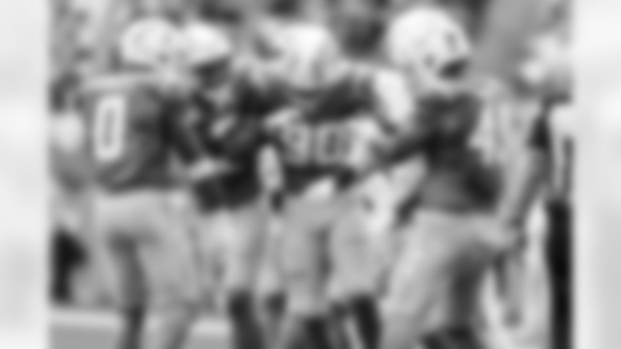 S Derwin James Jr. (3) and OLB Odafe Oweh (98)