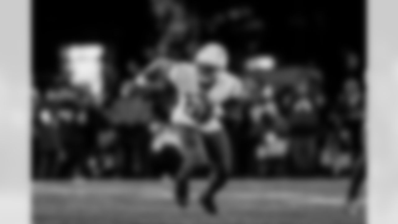 Check out the best shots from the Chargers Wild Card matchup against the Patriots!