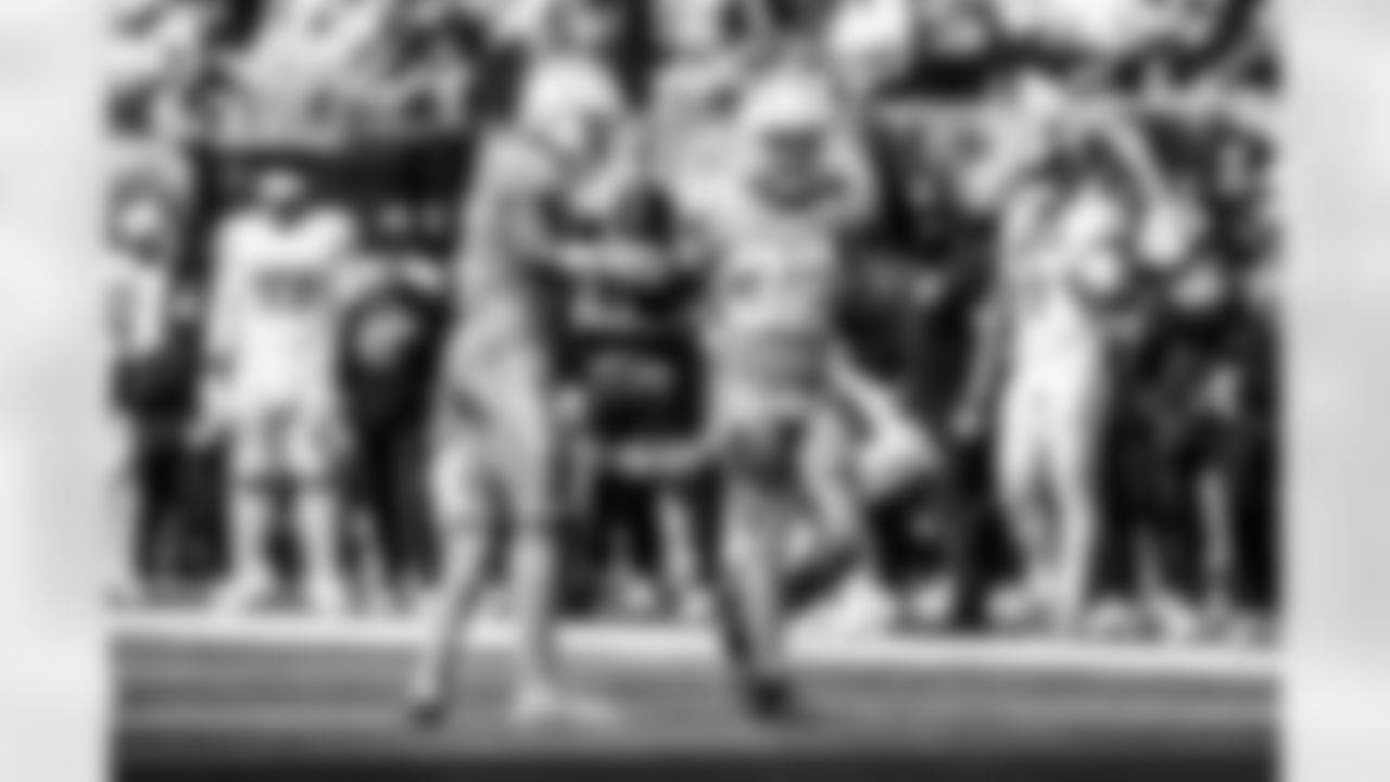 Take a look back at the Chargers Week 5 matchup with the Commanders in monochrome!
