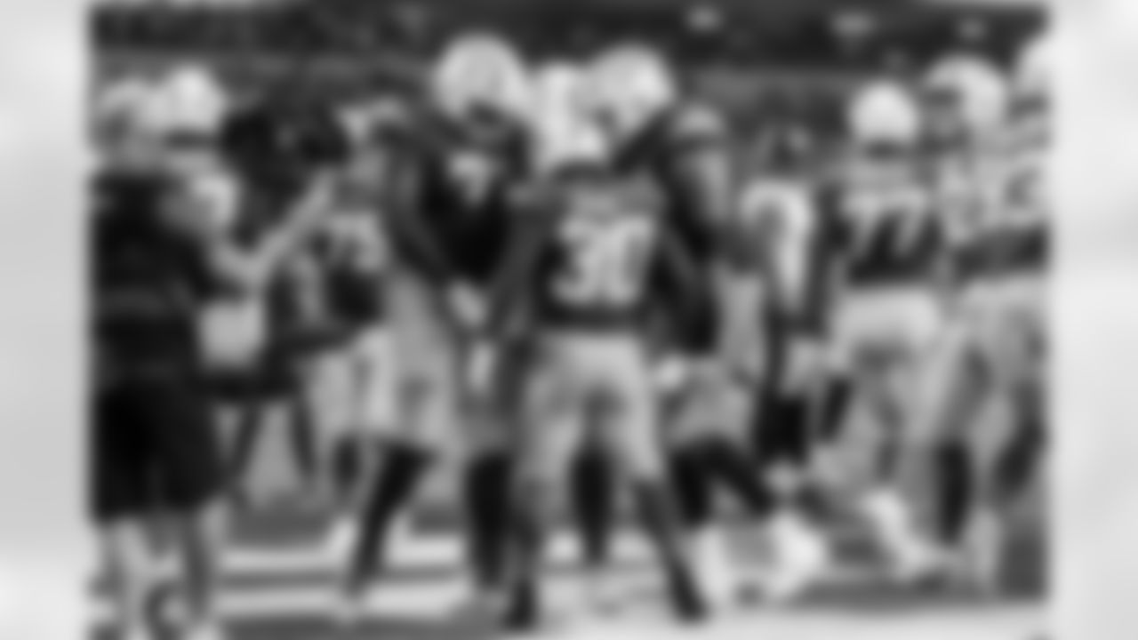 RB Kimani Vidal (30) and TE Tucker Fisk (42)